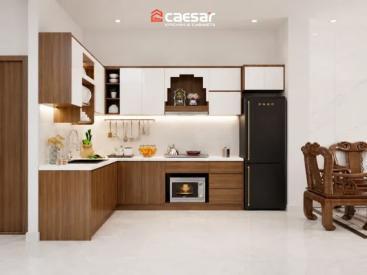 Tủ bếp chữ L có bàn thờ Ông Táo thiết kế đồng bộ với hệ tủ